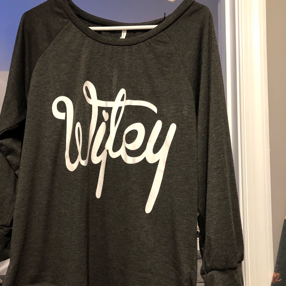 Dark gray long sleeve shirt with WIFEY on it